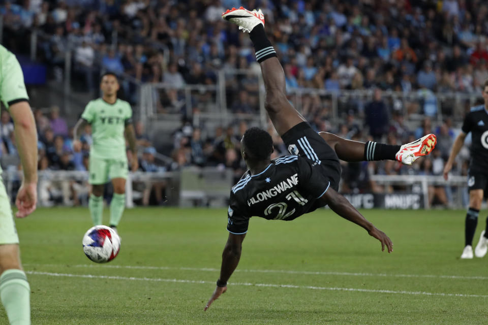 Minnesota United forward Bongokuhle Hlongwane (21) tries a bicycle kick against Austin FC in the second half of an MLS soccer game Saturday, July 8, 2023, in St. Paul, Minn. (AP Photo/Bruce Kluckhohn)