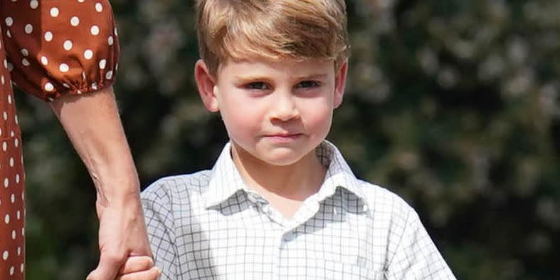 royal news about prince louis shown here on first day of school in 2022