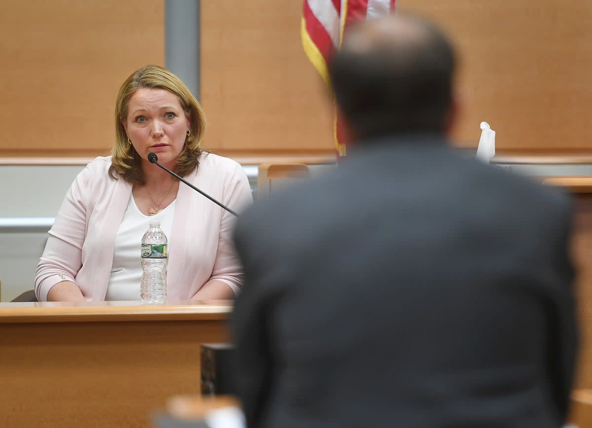 Nicole Hockley, mother of deceased Sandy Hook Elementary student Dylan Hockley, answers questions from lawyer Chris Mattei during her testimony in the Alex Jones defamation trial  (AP)