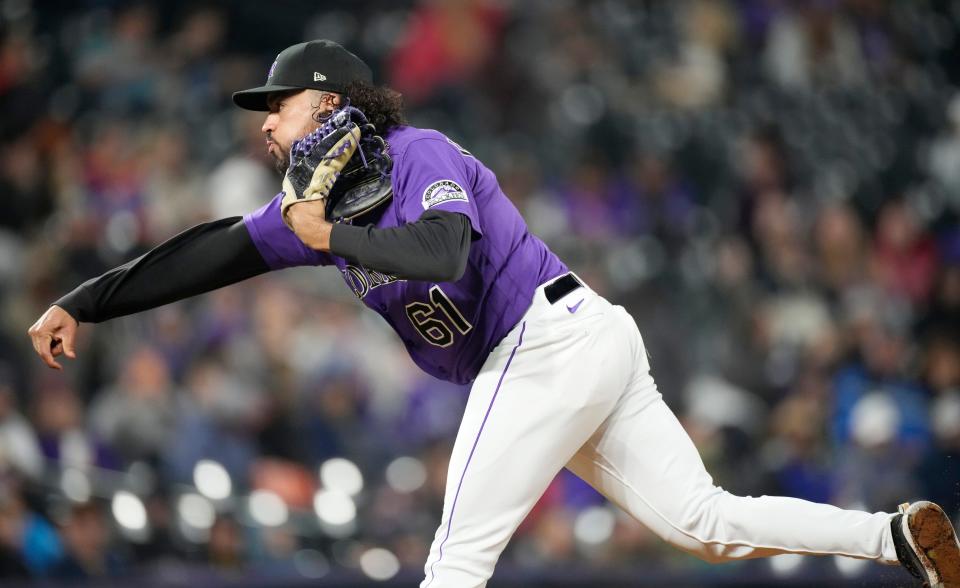 Colorado Rockies relief pitcher Justin Lawrence works against the Arizona Diamondbacks during the sixth inning of a baseball game Saturday, Sept. 10, 2022, in Denver. (AP Photo/David Zalubowski)