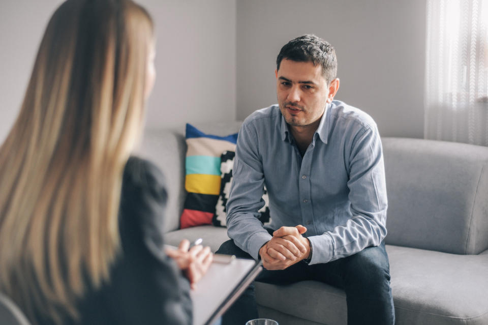 A man talking to a therapist.  (Getty Images)