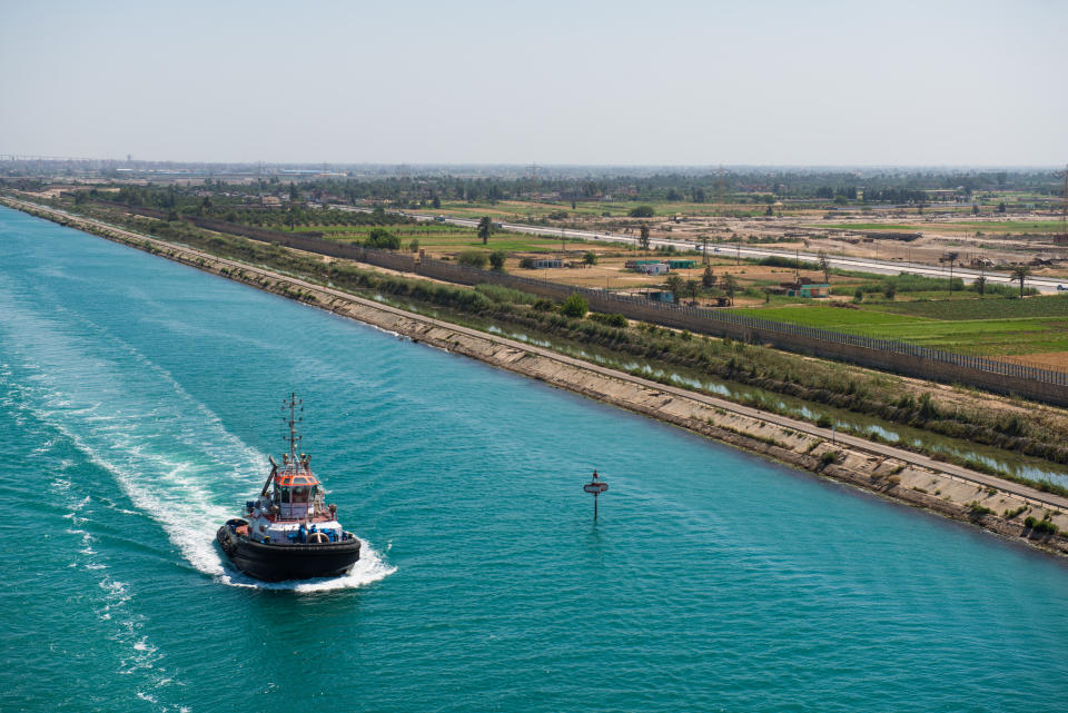 The Suez Canal is an artificial sea-level waterway in Egypt, connecting the Mediterranean Sea to the Red Sea through the Isthmus of Suez. Constructed by the Suez Canal Company between 1859 and 1869, it was officially opened on November 17, 1869.