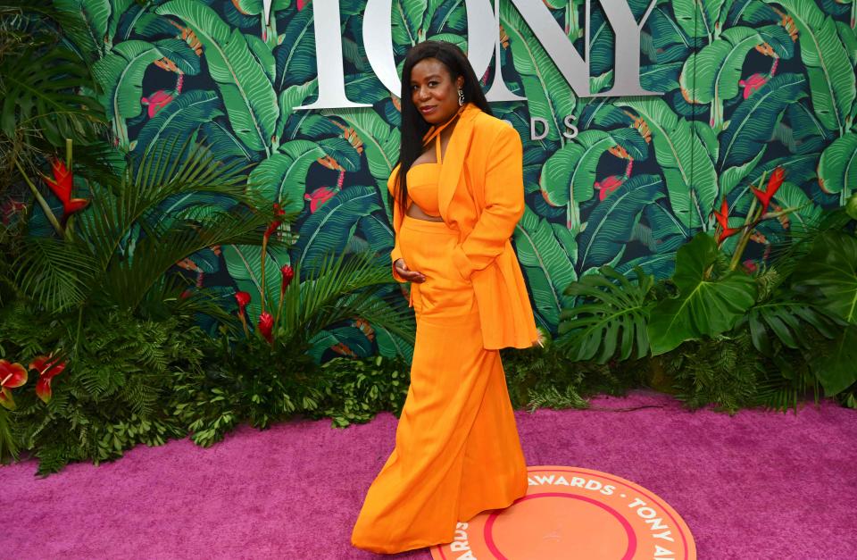 Uzo Aduba cradeled her baby bump on the 2023 Tony Awards red carpet.