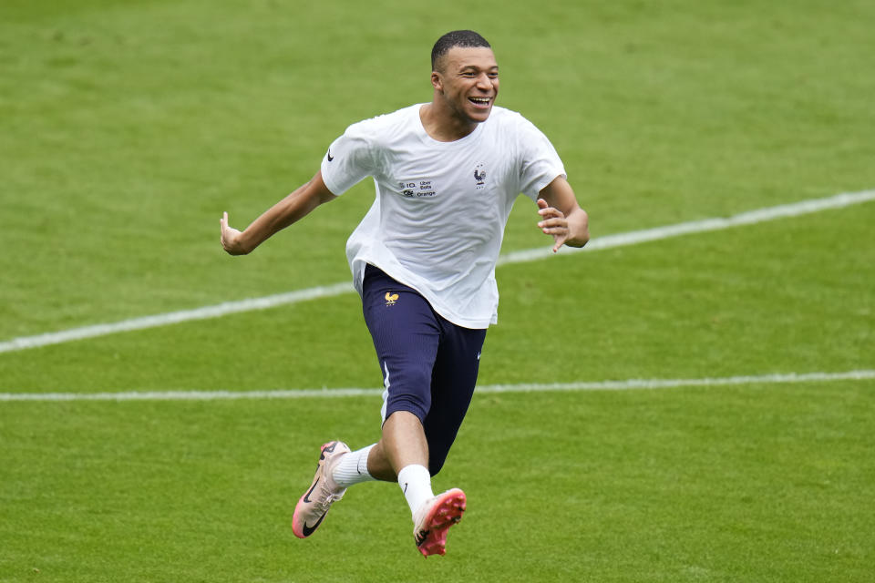 France's Kylian Mbappe gestures during a training session in Paderborn, Germany, Sunday, June 23, 2024. France will play against Poland during their Group D soccer match at the Euro 2024 soccer tournament on June 25. (AP Photo/Hassan Ammar)