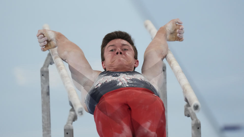 <p>Brody Malone, of the United States, performs on the parallel bars during the artistic gymnastics men's all-around final at the 2020 Summer Olympics, Wednesday, July 28, 2021, in Tokyo. (AP Photo/Gregory Bull)</p> 