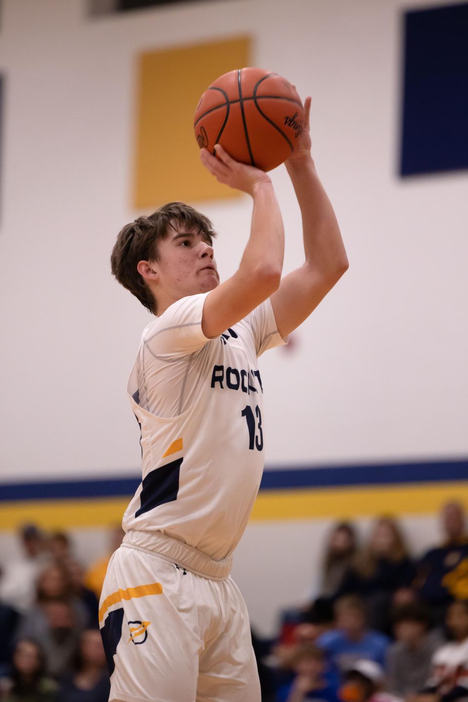 Streetsboro guard Jack Batten goes up for a 3-point-shot against Ravenna last year.