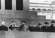 FILE - In this Nov. 7, 1957, file photo, China's Mao Tse-tung, third from left, and top Russian leaders salute from Lenin Mausoleum as parade passes below in Red Square in Moscow. China and Soviet Union enjoy a smooth relationship in the beginning of the 50s. From left are then President Dmitri, Voroshilov, Defense Minister Marshal Rodion Y. Malinovsky, who replaced Marshal Zhukov; Mao; communist party boss Nikita Khrushchev; Premier Nikolai Bulganin; Deputy Premier A.I. Mikoyan and M.A. Suslov, a member of ruling presidium. (AP Photo, File)