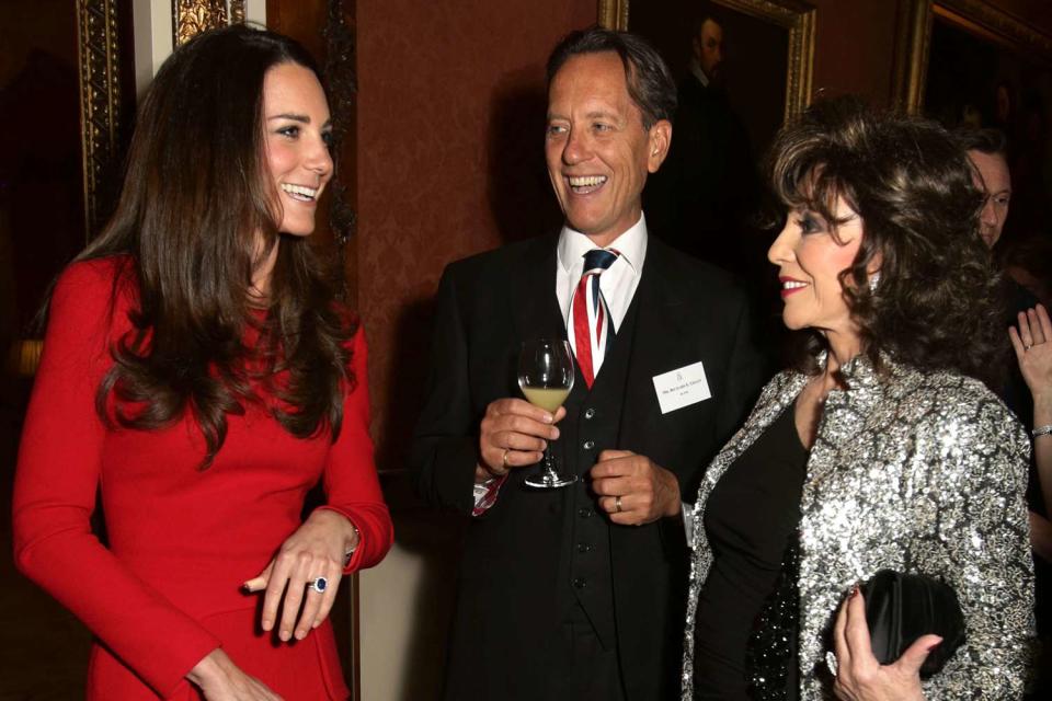 <p>Yui Mok - WPA Pool/Getty</p> Catherine, Duchess of Cambridge meets Richard E Grant and Joan Collins during the Dramatic Arts reception at Buckingham Palace on February 17, 2014.