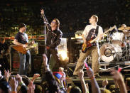 U2 performs during the halftime show at Super Bowl XXXVI in the Superdome, New Orleans, Louisiana, February 3, 2002. (Photo by KMazur/WireImage)