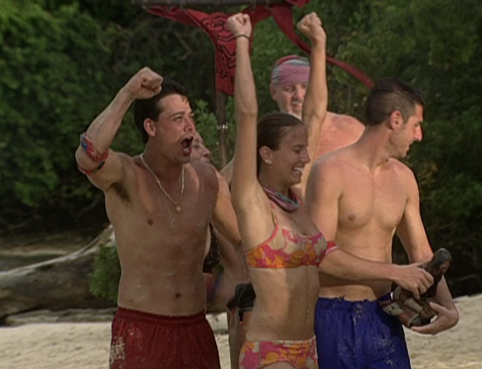 A tribe celebrates on Survivor: All-Stars
