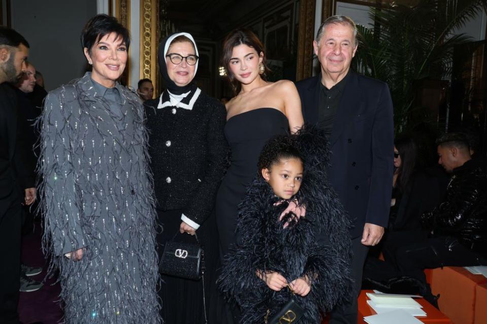 kris jenner, kylie jenner, and stormi webster at valentino's show