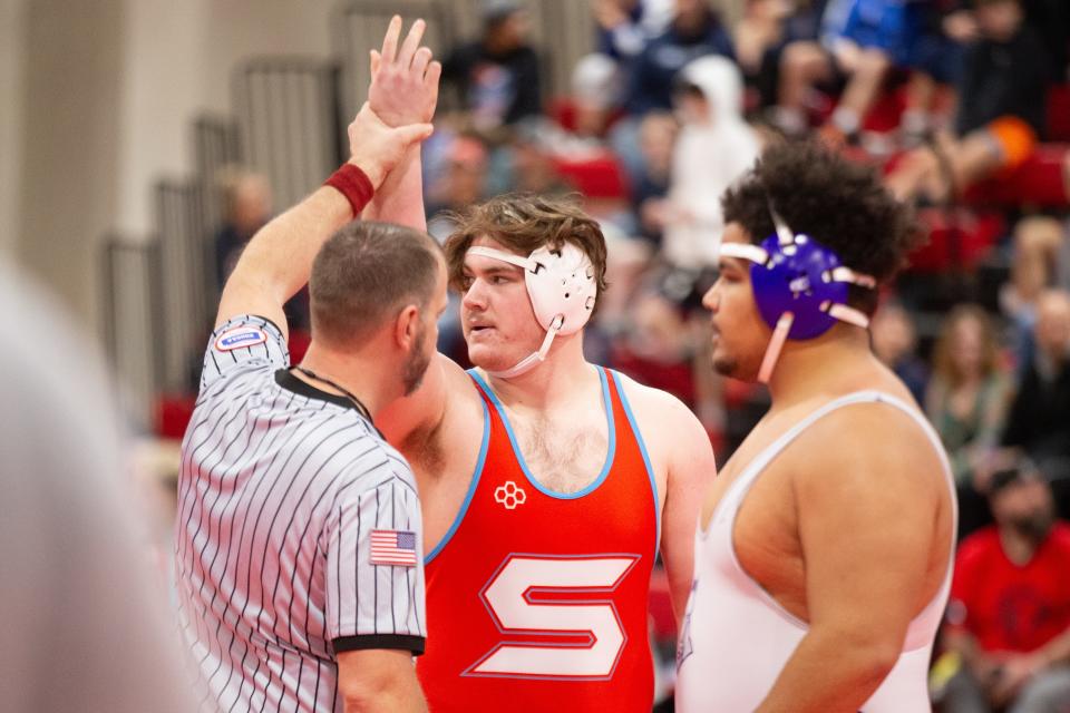 Shawnee Heights' Rykan Carver wins his bout against Topeka West's Vincent Redmond in the 285 class at the United Kansas Conference Championship Saturday, February 3, 2024, inside Shawnee Heights High School.