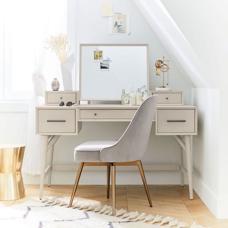 <p><a href="https://go.redirectingat.com?id=74968X1596630&url=https%3A%2F%2Fwww.westelm.com%2Fproducts%2Fmid-century-vanity-hutch-acorn-d7203&sref=https%3A%2F%2Fwww.cosmopolitan.com%2Flifestyle%2Fg36689175%2Fbest-makeup-vanity-with-storage%2F" rel="nofollow noopener" target="_blank" data-ylk="slk:Shop Now;elm:context_link;itc:0;sec:content-canvas" class="link ">Shop Now</a></p><p>Mid-Century Vanity Desk Set</p><p>westelm.com</p><p>$1199.00</p><span class="copyright">West Elm</span>