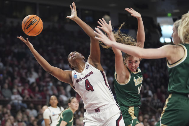 South Carolina forward Aliyah Boston (4) and South Florida forward Emma Johansson, second from right, battle for a rebound during the first half in a second-round college basketball game in the NCAA Tournament, Sunday, March 19, 2023, in Columbia, S.C. (AP Photo/Sean Rayford)