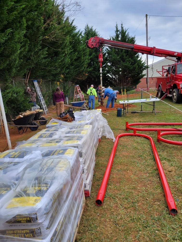 Community volunteers assisted with the installation of two new playgrounds at Mars Hill Elementary beginning Nov. 15.