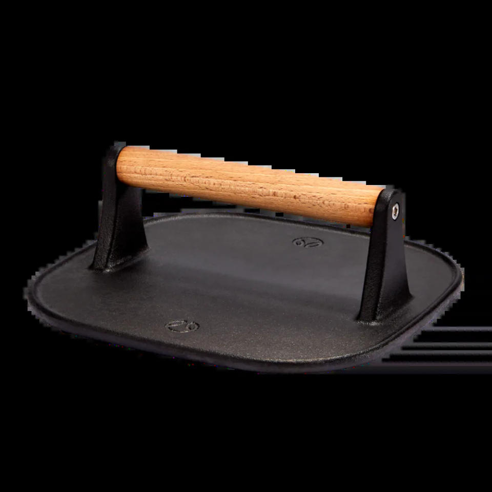 PADERNO Signature Pre-Seasoned Cast Iron Panini & Burger Grill Press. (Photo via Canadian Tire)