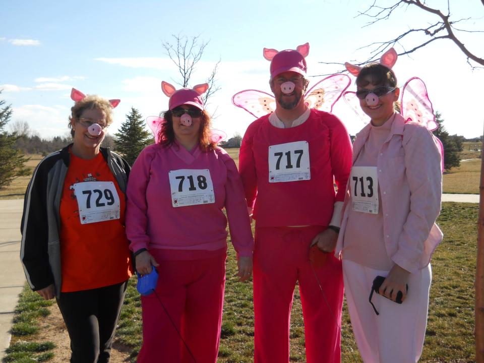 Runners show off their outfits at the 2015 Flying Pig 5K