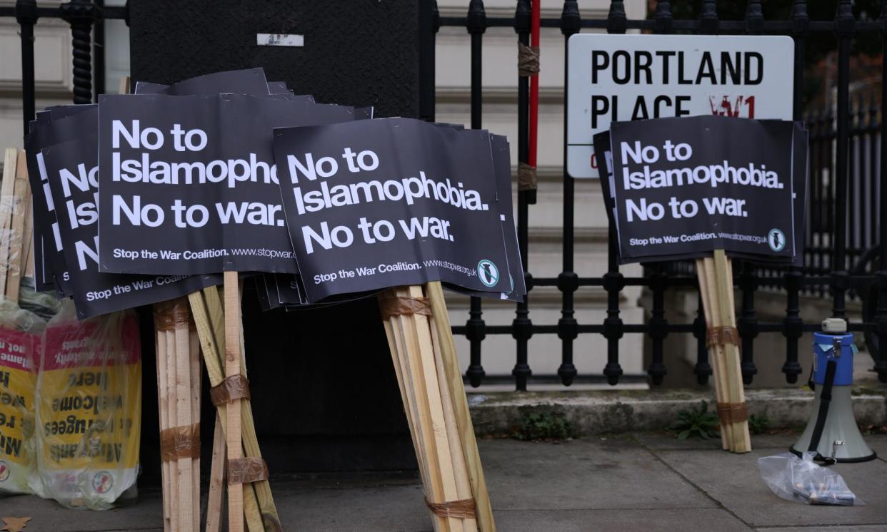 <span>Protesters leave placards outside an embassy in London last year, saying no to Islamophobia, but why is the term controversial?</span><span>Photograph: Hollie Adams/Getty Images</span>