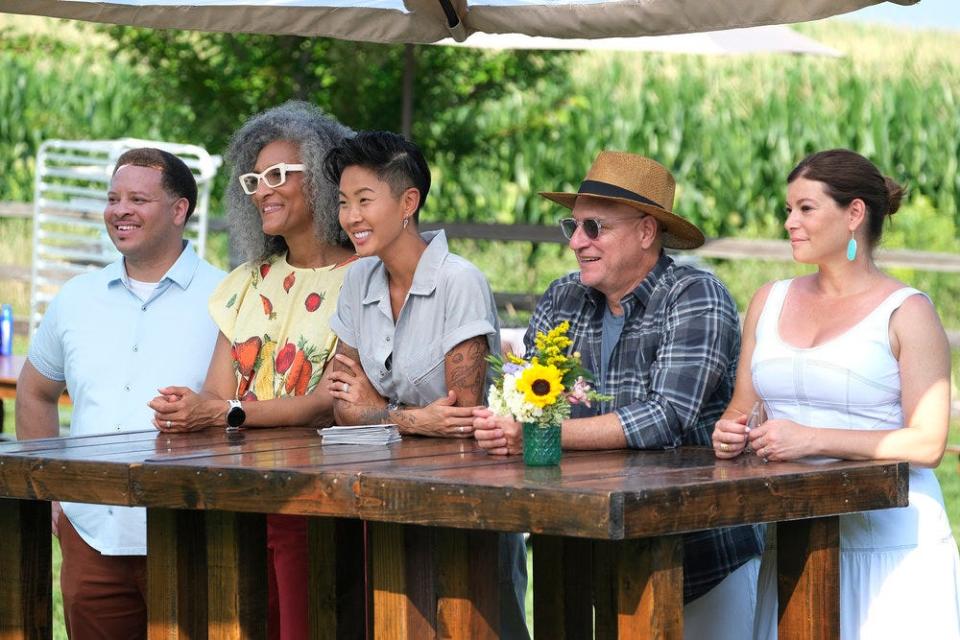 Milwaukee chef Dane Baldwin (left), joined guest judge Carla Hall, host Kristen Kish and perennial judges Tom Colicchio and Gail Simmons as they judged the cheese festival dishes on "Top Chef: Wisconsin" Episode 3.