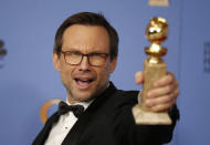 Christian Slater poses backstage with the award for Best Performance by an Actor in a Supporting Role in a Series, Limited Series or Motion Picture Made for Television for his role in "Mr. Robot" at the 73rd Golden Globe Awards in Beverly Hills, California January 10, 2016. REUTERS/Lucy Nicholson