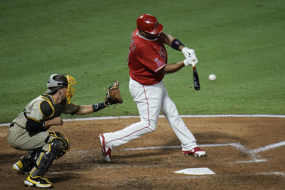 Los Angeles Angels' Albert Pujols hits a double during the fourth inning of a baseball game against the San Diego Padres, Wednesday, Sept. 2, 2020, in Anaheim, Calif. (AP Photo/Jae C. Hong)