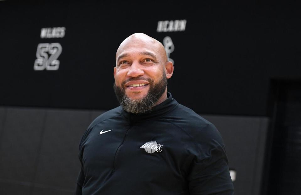 Lakers coach Darvin Ham smiles during a news conference in El Segundo on Thursday.