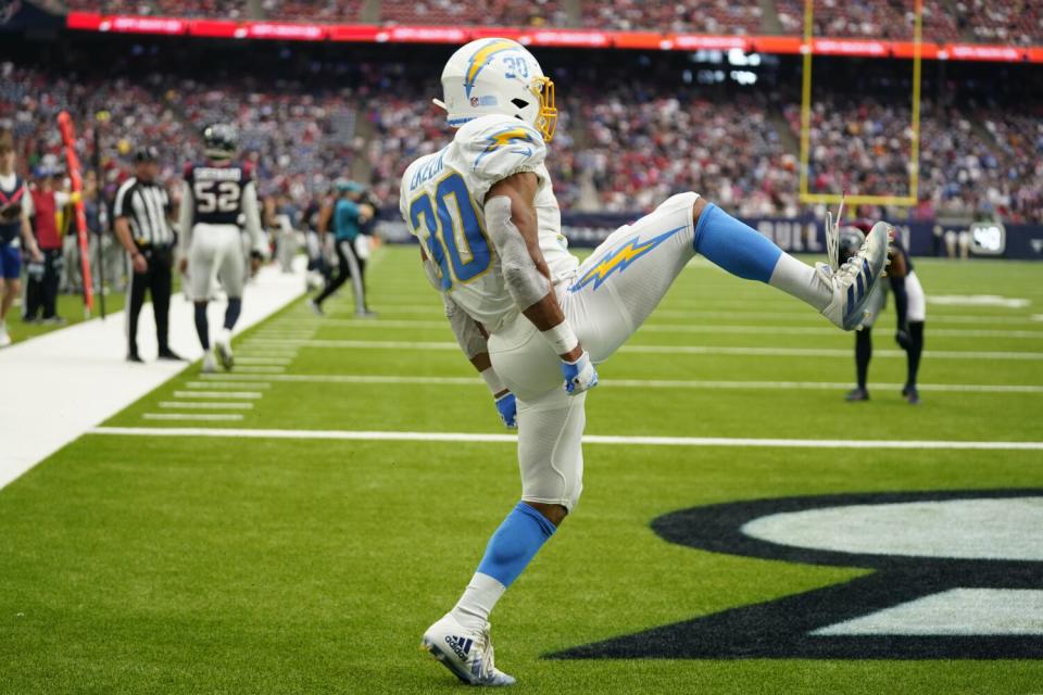 Chargers running back Austin Ekeler celebrates his touchdown against the Houston Texans in the second half.