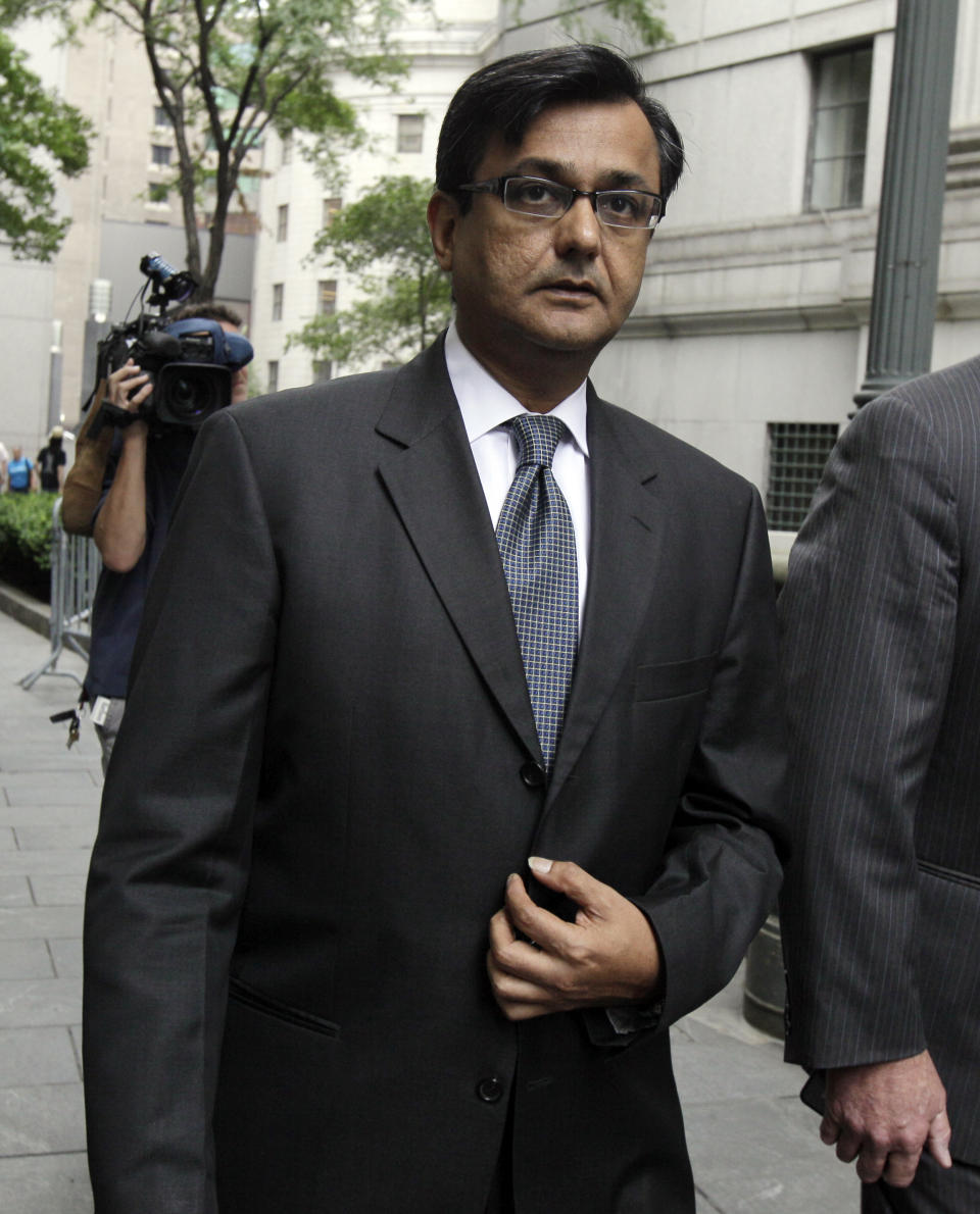 Anil Kumar, a former financial consultant-turned-government witness, leaves Federal Court in New York, Thursday, July 19, 2012. Kumar was sentenced Thursday to two years of probation after prosecutors credited him with helping convict a pair of Wall Street titans on insider trading charges. (AP Photo/Richard Drew)