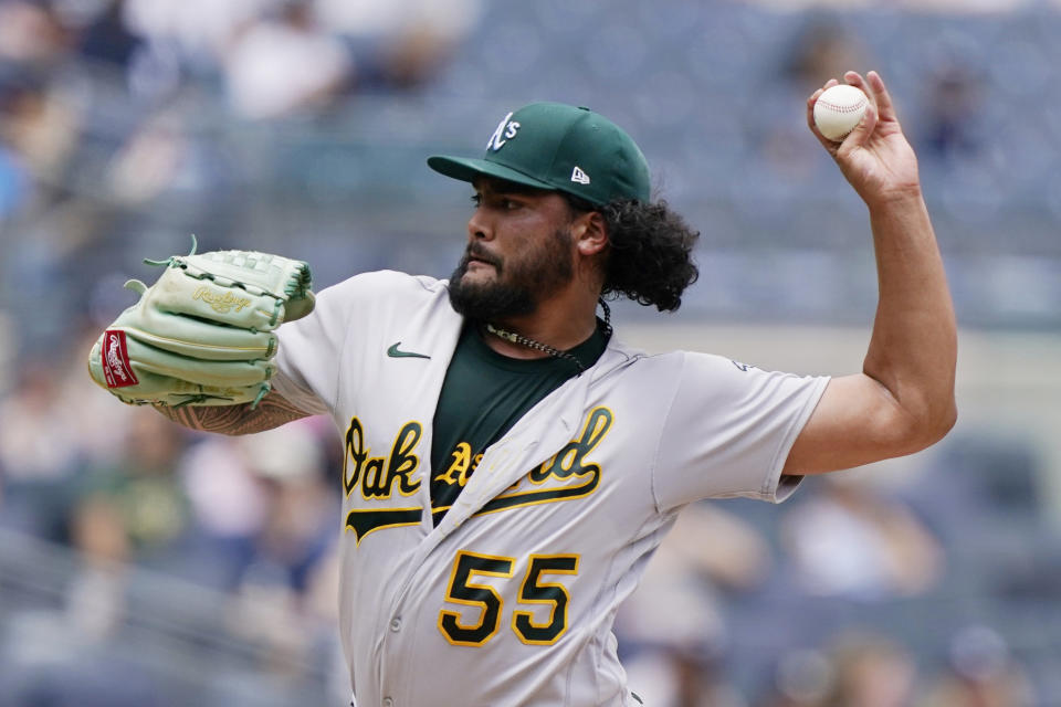 Oakland Athletics starting pitcher Sean Manaea (55) winds up during the first inning of a baseball game against the New York Yankees, Sunday, June 20, 2021, at Yankee Stadium in New York. (AP Photo/Kathy Willens)