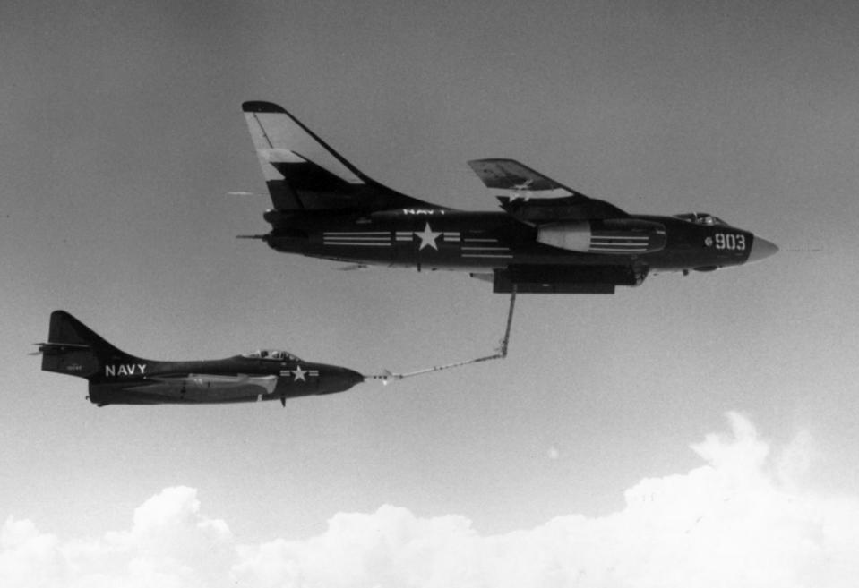 In a different experiment, a probe-equipped U.S. Navy F9F-7 Cougar refuels from an adapted A3D-2 Skywarrior in the mid-1950s. <em>U.S. Navy</em><br>