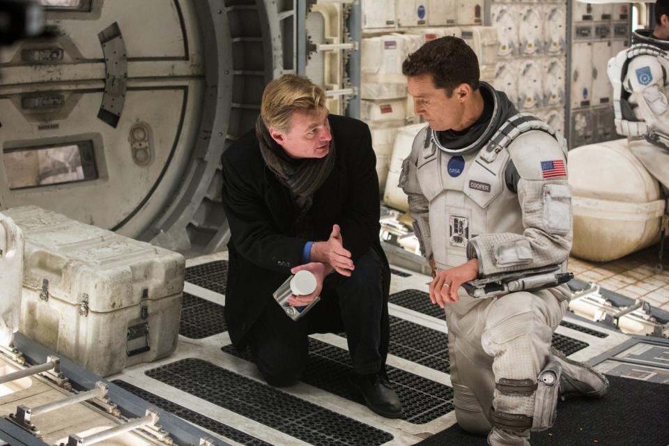 Nolan and Matthew McConaughey on the set of Interstellar (Credit: Warner Bros)