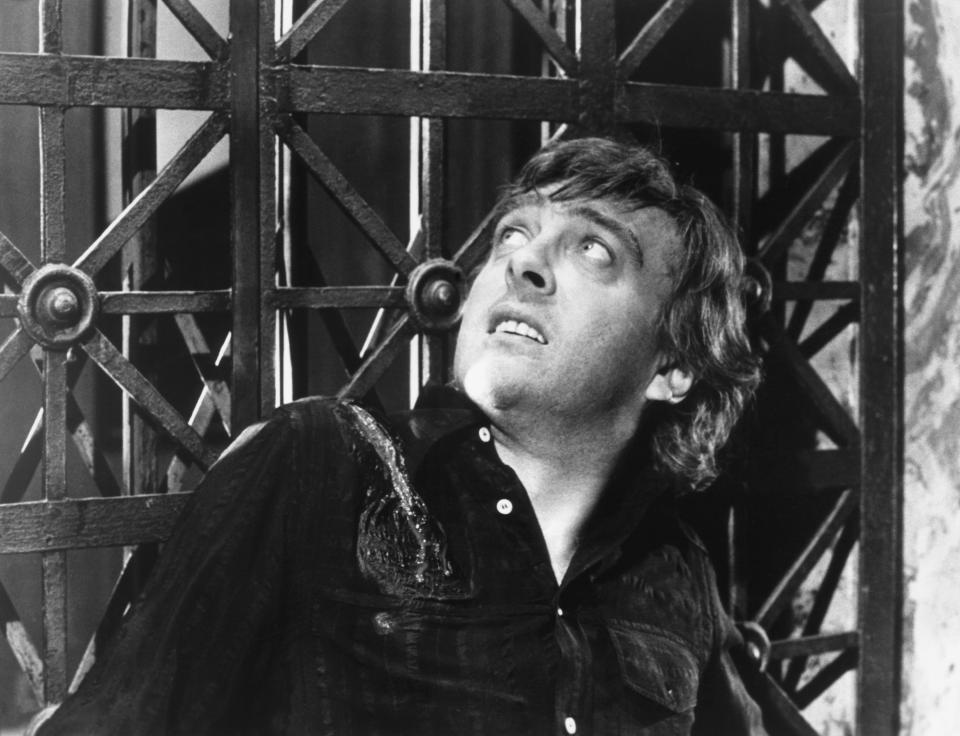 David Hemmings looking up in fear.