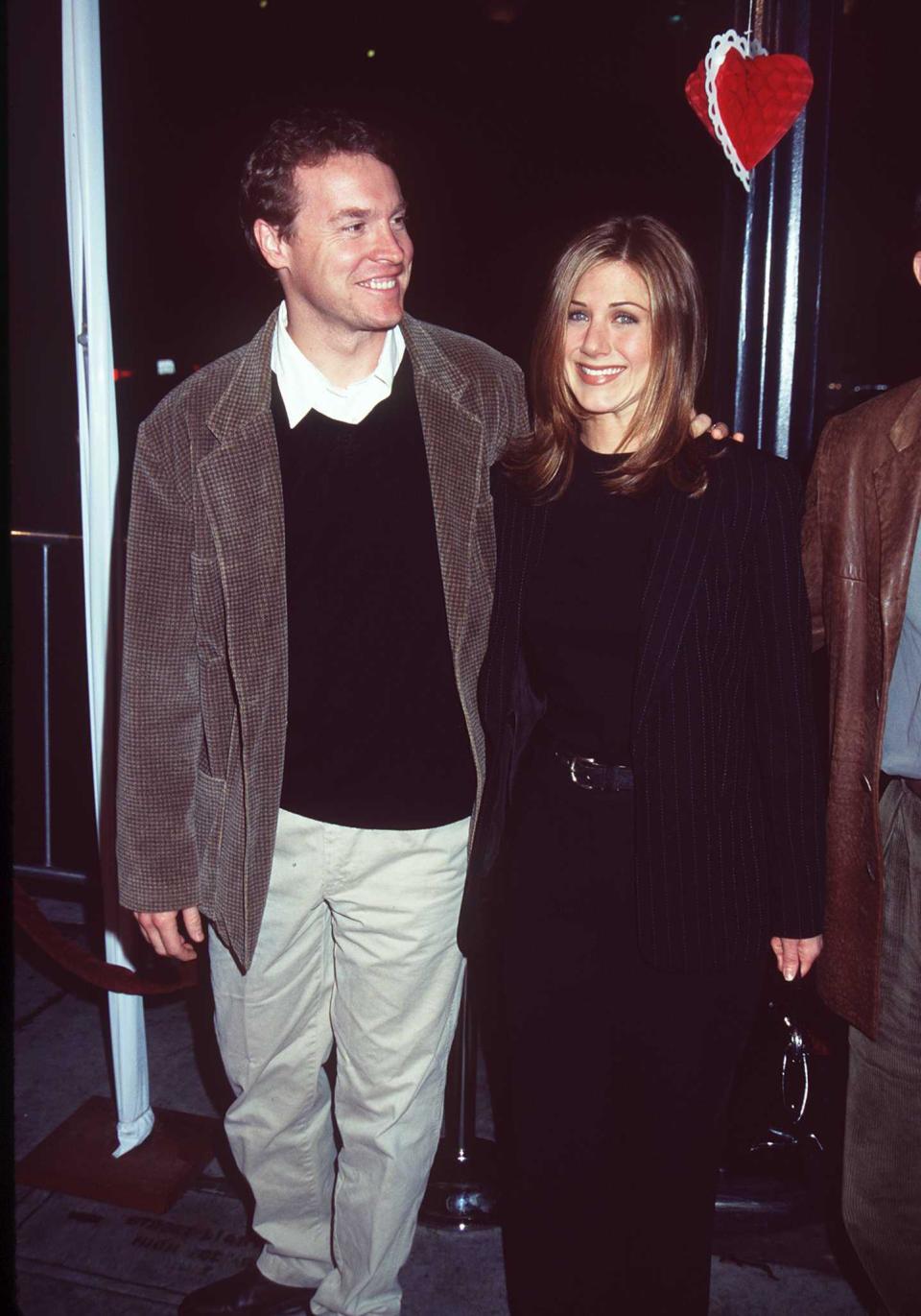 374530 05: FILE PHOTO: Friends star Jennifer Aniston, right, and Tate Donovon at the Premiere of "FOOLS RUSH IN" in Santa Monica, California February 10, 1997. On July 27, 2000, it has been reported that Brad Pitt and Jennifer Aniston will be married over the weekend. (Photo by Online USA)