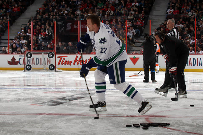 OTTAWA, ON - JANUARY 28: Daniel Sedin #22 of the Vancouver Canucks and Team Alfredsson takes a shot during the G Series NHL Skills Challenge Relay part of the 2012 Molson Canadian NHL All-Star Skills Competition at Scotiabank Place on January 28, 2012 in Ottawa, Ontario, Canada. (Photo by Bruce Bennett/Getty Images)