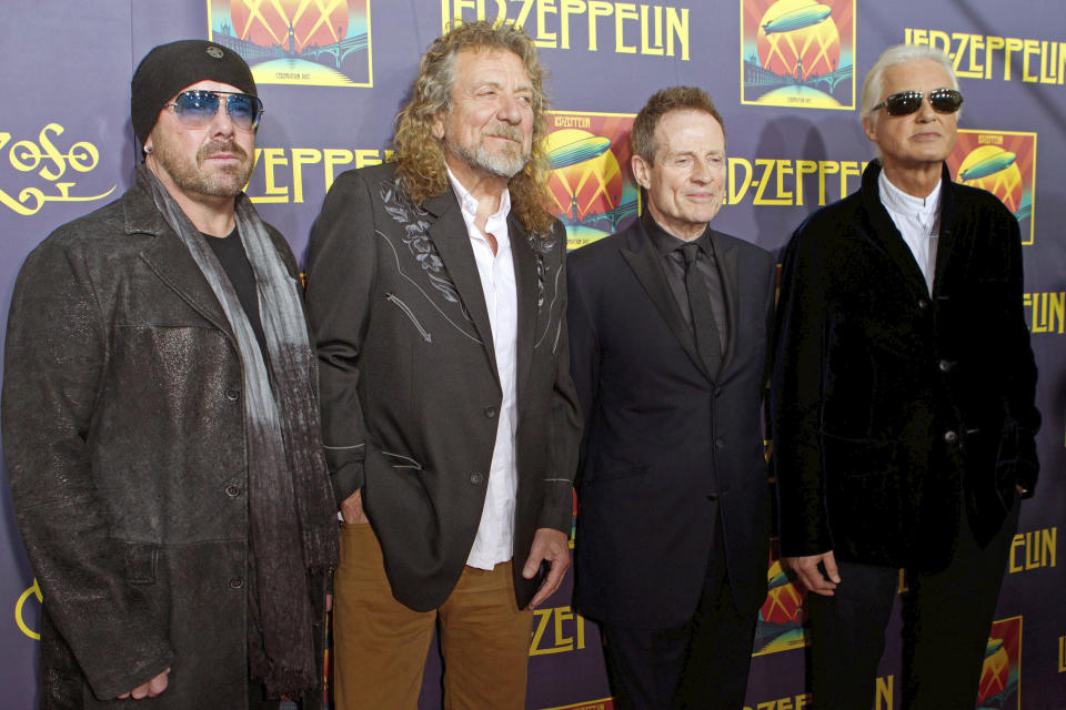 FILE - This Oct. 9, 2012 file photo shows Led Zeppelin members, from left, Jason Bonham, Robert Plant, John Paul Jones and Jimmy Page at the "Led Zeppelin: Celebration Day" premiere in New York. A federal appeals court on Monday, March 9, 2020, restored a jury verdict that found Led Zeppelin did not steal “Stairway to Heaven." (Photo by Dario Cantatore/Invision/AP, File)