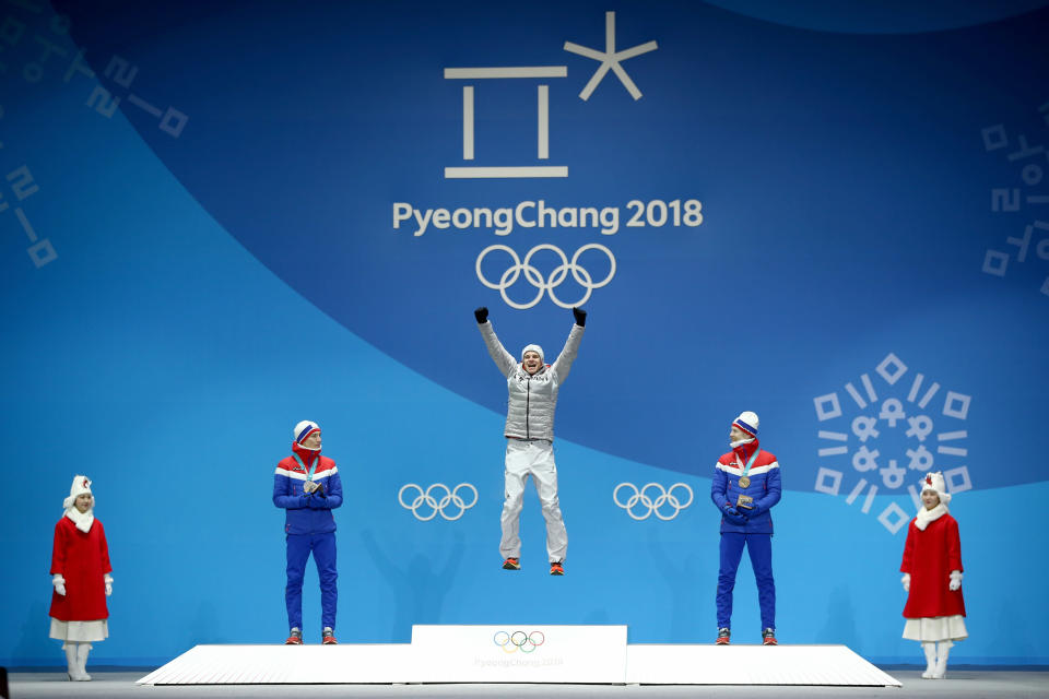 <p>Gold medalist Andreas Wellinger of Germany (C) celebrates on the podium with silver medalist Johann Andre Forfang of Norway (L) and bronze medalist Robert Johansson of Norway (R) during the Medal Ceremony for the Men’s Ski Jumping Normal Hill Individual on day two of the PyeongChang 2018 Winter Olympic Games at Medal Plaza on February 11, 2018 in Pyeongchang-gun, South Korea. (Photo by Dan Istitene/Getty Images) </p>
