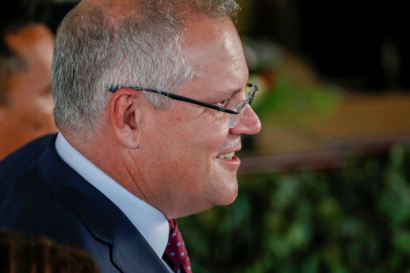 Australian Prime Minister Scott Morrison reacts after attending the inauguration of Indonesia's President Joko Widodo for the second term, at the House of Representatives building in Jakarta