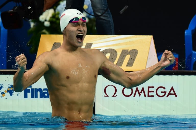 China's Sun Yang celebrates after winning the men's 400m freestyle final swimming event at the 2015 FINA World Championships in Kazan on August 2, 2015