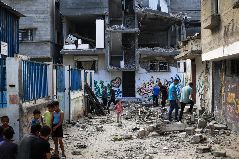 Palestinians asses the damage following an Israeli strike in the Nuseirat refugee camp in the central Gaza Strip on July 6, 2024. The health ministry in Hamas-run Gaza said on July 6 that at least 38,098 people have been killed in nine months of war between Israel and Palestinian militants. (Photo by Eyad BABA / AFP) (Photo by EYAD BABA/AFP via Getty Images)