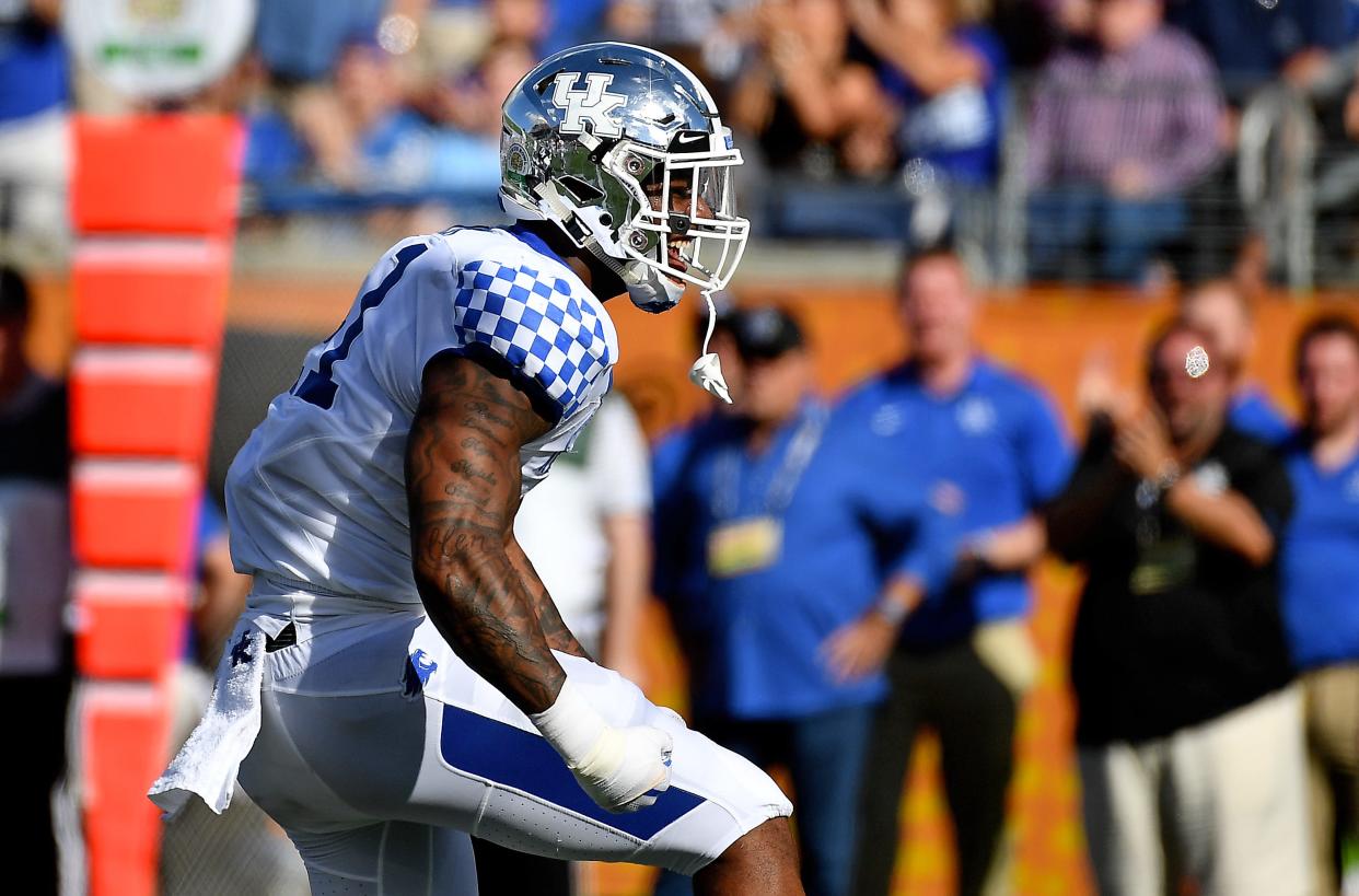 Kentucky Wildcats linebacker Josh Allen (41) celebrates after sacking Penn State Nittany Lions quarterback Trace McSorley (9) during the first half in the 2019 Citrus Bowl at Camping World Stadium on Tuesday, Jan. 1, 2019, in Orlando, Florida.