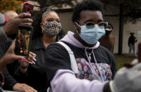 Lizzo takes photos with supporters during a campaign event in Detroit for Democratic Presidential Candidate Joe Biden and Kamala Harris on Friday Oct. 23, 2020 in Detroit. (Nicole Hester/Ann Arbor News via AP)