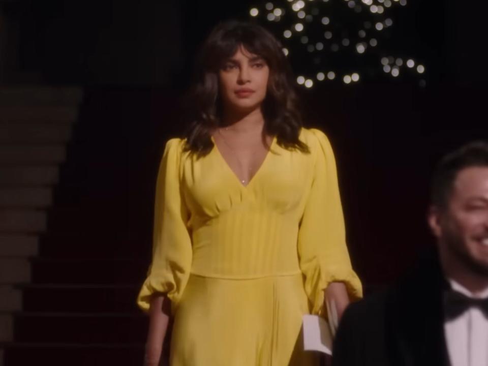 Priyanka Chopra Jonas walking down a set of stairs in love again