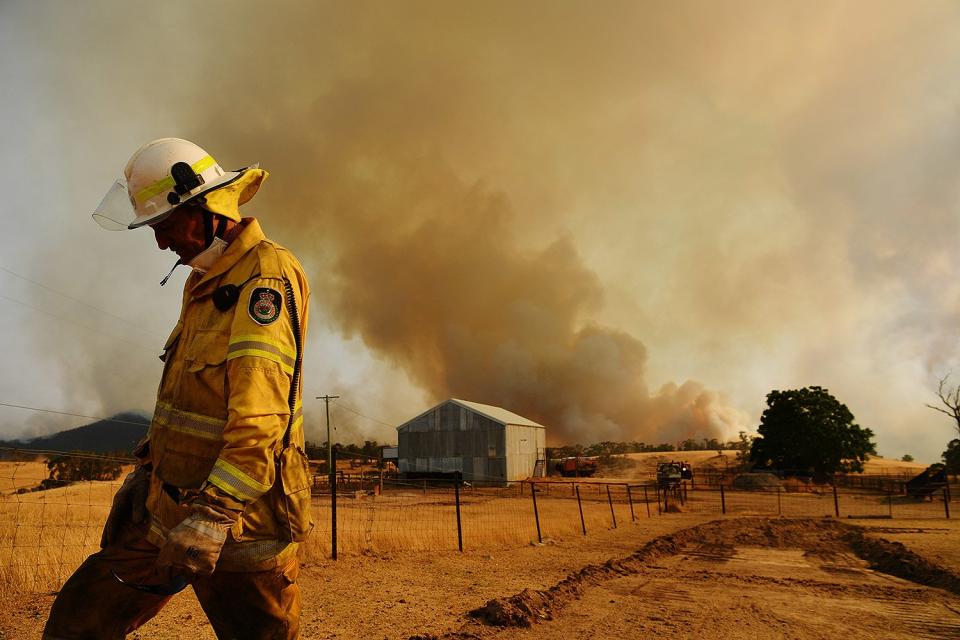 Firefighter Trevor Stewart surveys a fire on Jan. 11 in Tumburumba, Australia. 