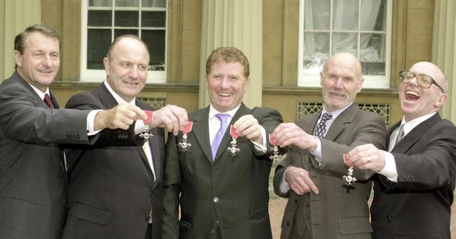 Alan Ball, centre, receives an MBE in 2000 alongside fellow World Cup winners, left to right, Roger Hunt, George Cohen, Ray Wilson and Nobby Stiles