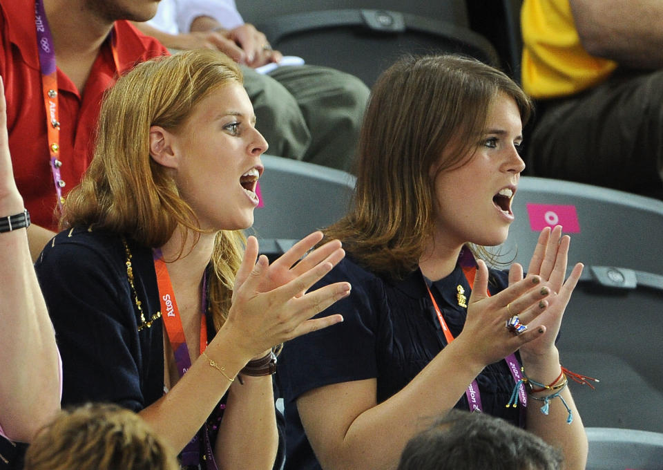 Princess Beatrice (L) and Princess Eugenie enkoy the atmosphere during Day 6 of the London 2012 Olympic Games at Velodrome on August 2, 2012 in London, England. (Photo by Pascal Le Segretain/Getty Images)