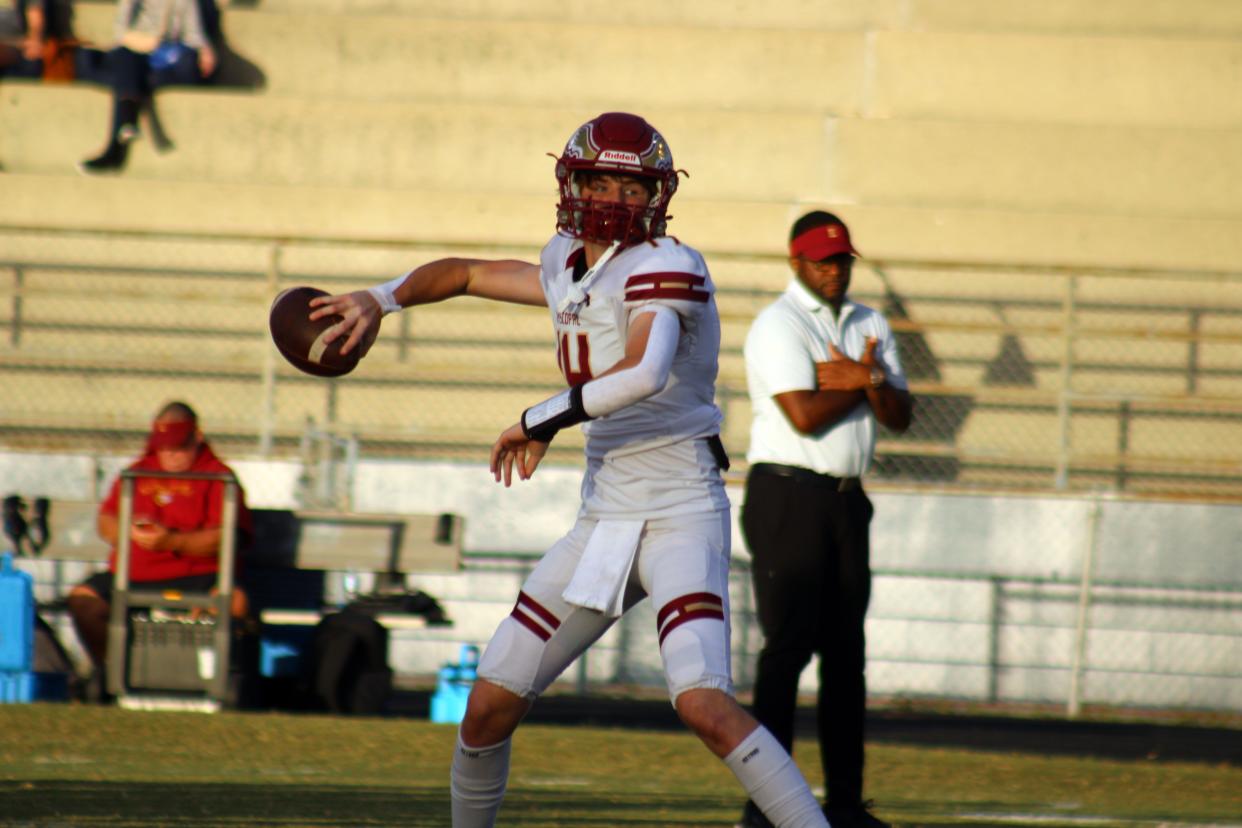 Episcopal quarterback Turner Glenn (14) fires a pass in warm-ups before a high school football game against Wolfson on October 26, 2023. [Clayton Freeman/Florida Times-Union]