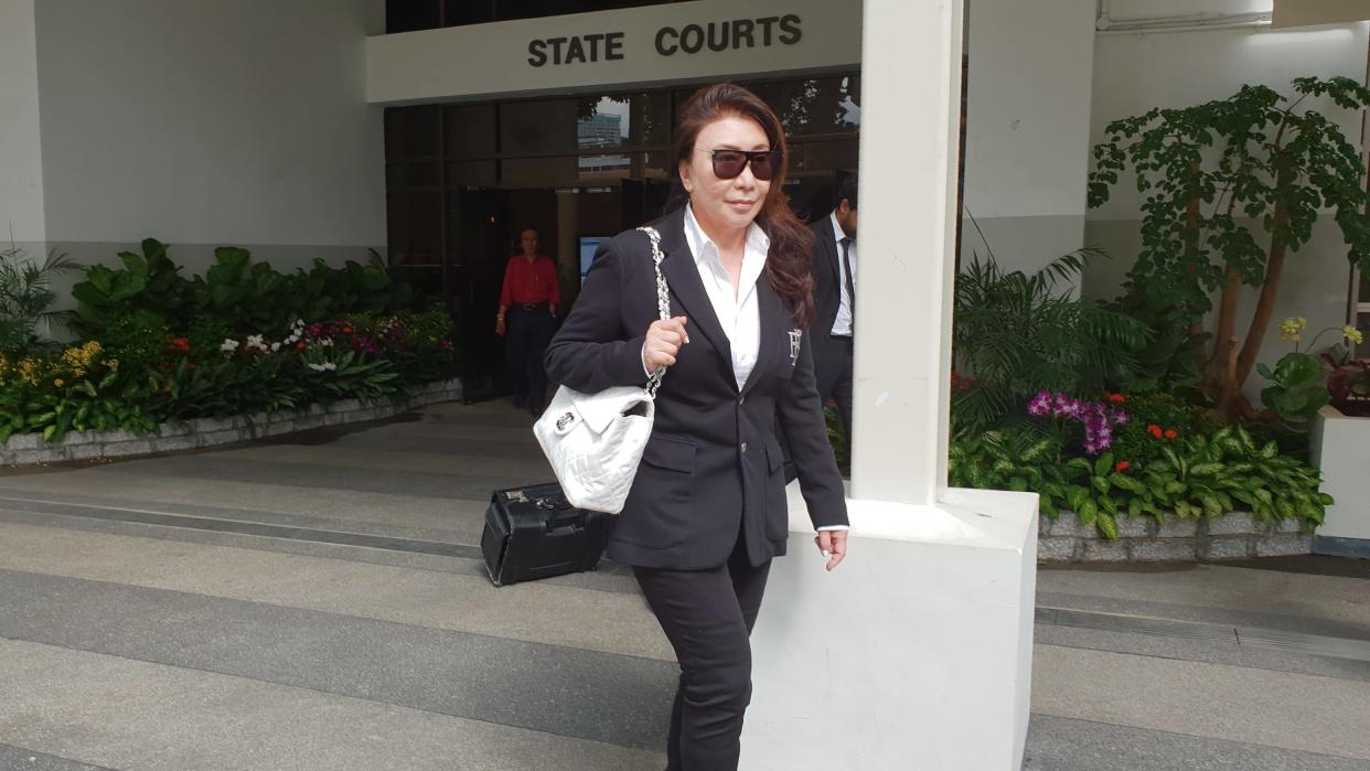 Ferrari driver Shi Ka Yee leaving the State Courts on 12 October 2018 after she was sentenced for various offences. PHOTO: Wan Ting Koh/Yahoo News Singapore