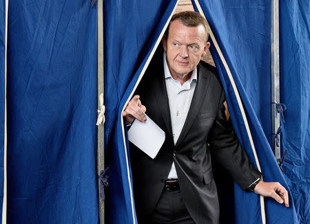 Leader of opposition party Venstre, Lars Loekke Rasmussen, casts his vote during general election at Nyboder school, in Copenhagen, June 18, 2015. REUTERS/Nils Meilvang/Scanpix Denmark