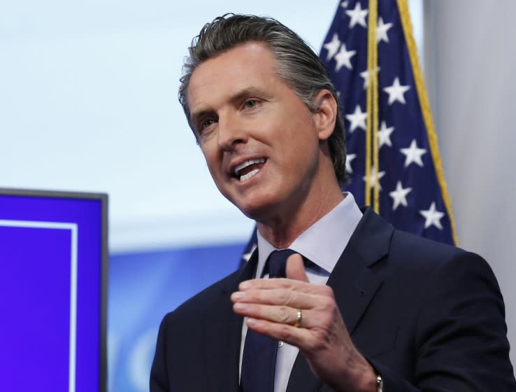 FILE - In this Tuesday, April 14, 2020, file photo California Gov. Gavin Newsom speaks during a news conference at the Governor's Office of Emergency Services in Rancho Cordova, Calif. A coalition of marijuana companies, churches and advocacy groups is asking Newsom for a temporary cut in the state's hefty pot taxes. The group that includes the California State Conference of the NAACP, Los Angeles Metropolitan Churches and the industry group Southern California Coalition warned in a letter to the governor that the coronavirus crisis and a crashing economy will take an especially heavy toll on businesses run by minorities who were disproportionately targeted during the decades-long drug war. (AP Photo/Rich Pedroncelli, Pool, File)