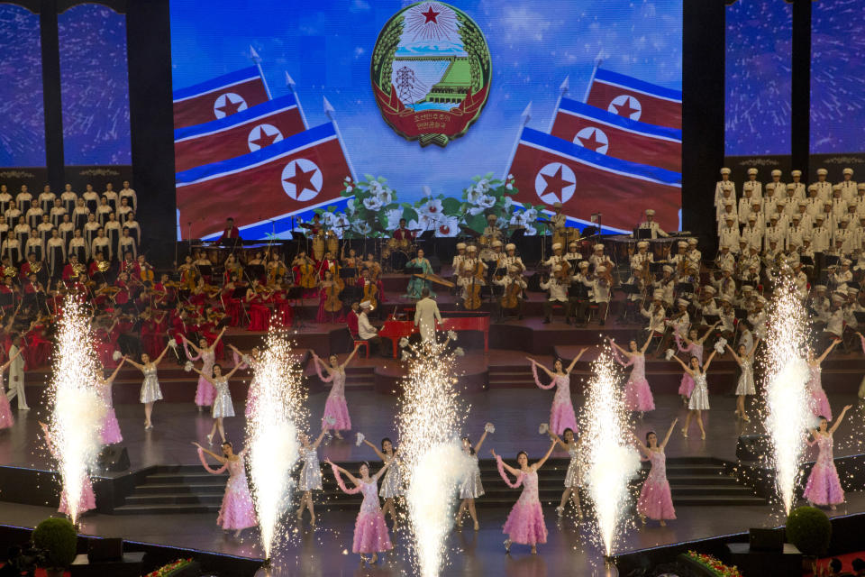 Performers dance during an evening gala held on the eve of the 70th anniversary of North Korea's founding day in Pyongyang, North Korea, Saturday, Sept. 8, 2018. North Korea will be staging a major military parade, huge rallies and reviving its iconic mass games on Sunday to mark its 70th anniversary as a nation. (AP Photo/Ng Han Guan)